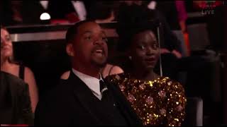 Will Smith slaps Chris Rock at 2022 Academy Awards / Oscar ceremony.