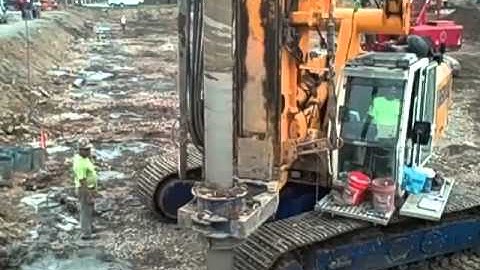 Augercast displacement pile