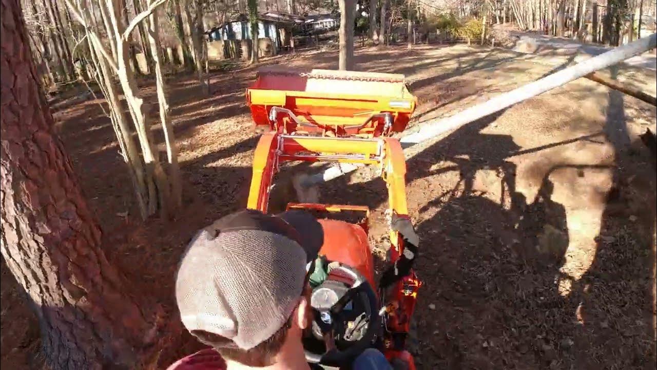 Kubota BX23S removing a basketball goal pole YouTube