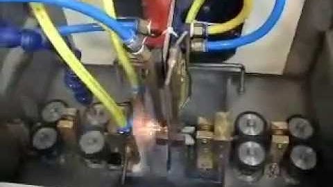 Induction hardening machine for band saw blade