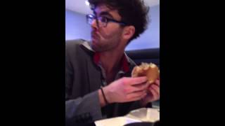Mumby eating burger