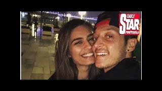 Mesut Ozil and fiancee Amine Gulse celebrate in Istanbul