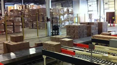 Multi Lane Robotic Palletizing with AGV Forklift