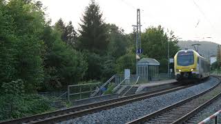 Abellio Go Ahead Regional Express train passing train station with horn honking.