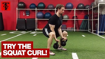 Isolateral Kettlebell Squat and Curl