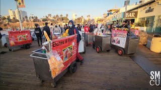 UNPERMITTED VENDORS STORM PIER PAST POLICE