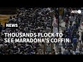 Thousands of fans flock to see Maradona's coffin | AFP