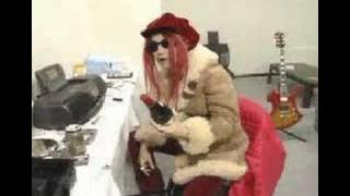 Hide of X Japan receiving alcohol.