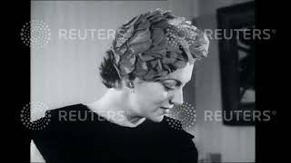 1952 Models try on hat designs by Simone Mirman