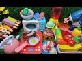 Diy mini food cookingwith cut fruits and vegetables for colorful dish using playdoh and kitchen set