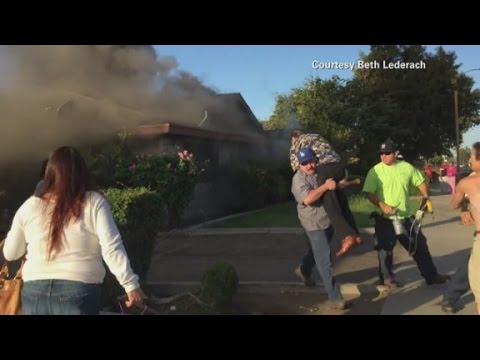 mystery-hero-saves-man-from-fire-in-home