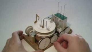 Automata for music box - flying bird and circling notes