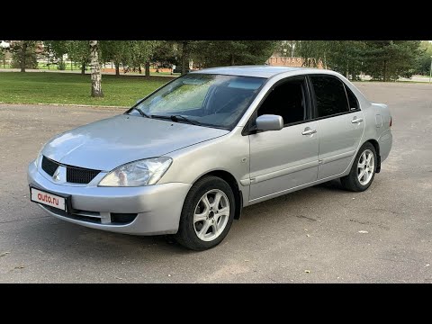 замена передних колодок на mitsubishi lancer 9