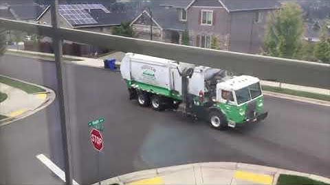 Hoodview and Waste Management Garbage Trucks in Oregon