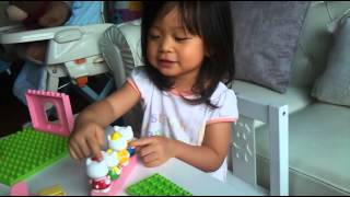 Hailey playing with hello kitty block 20120522