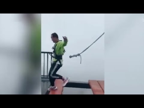 Safety cord falls off harness as man hops on high bridge in SW China