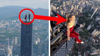 This Russian Couple took a Dangerous Selfie at The World's Second Tallest Building #merdeka118