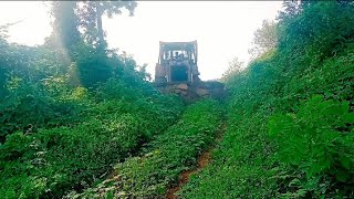 Restoring CAT D6R XL Infrastructure Clearing Roads to Improve Safety