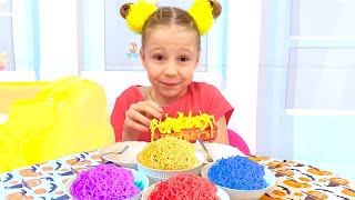 Nastya and dad are preparing colored noodles