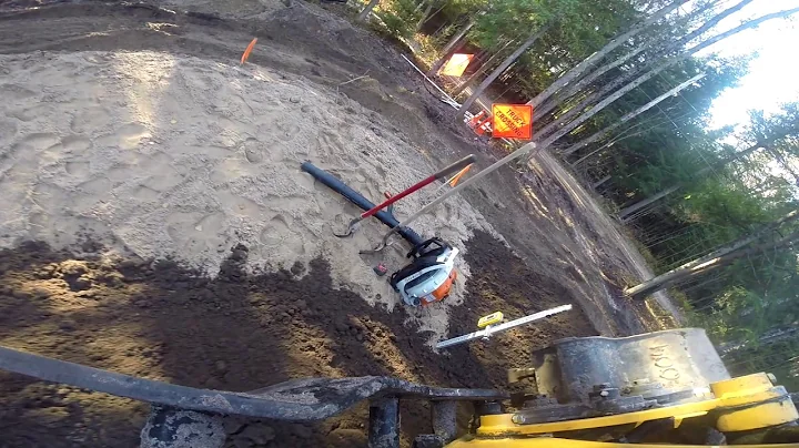 308 spreading drain stone and topsoil   Bucket view GoPro