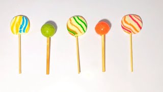 Oddly Satisfying ASMR Video of Lollipops | Unboxing Glossy Rainbow lollipop candies Relaxing video