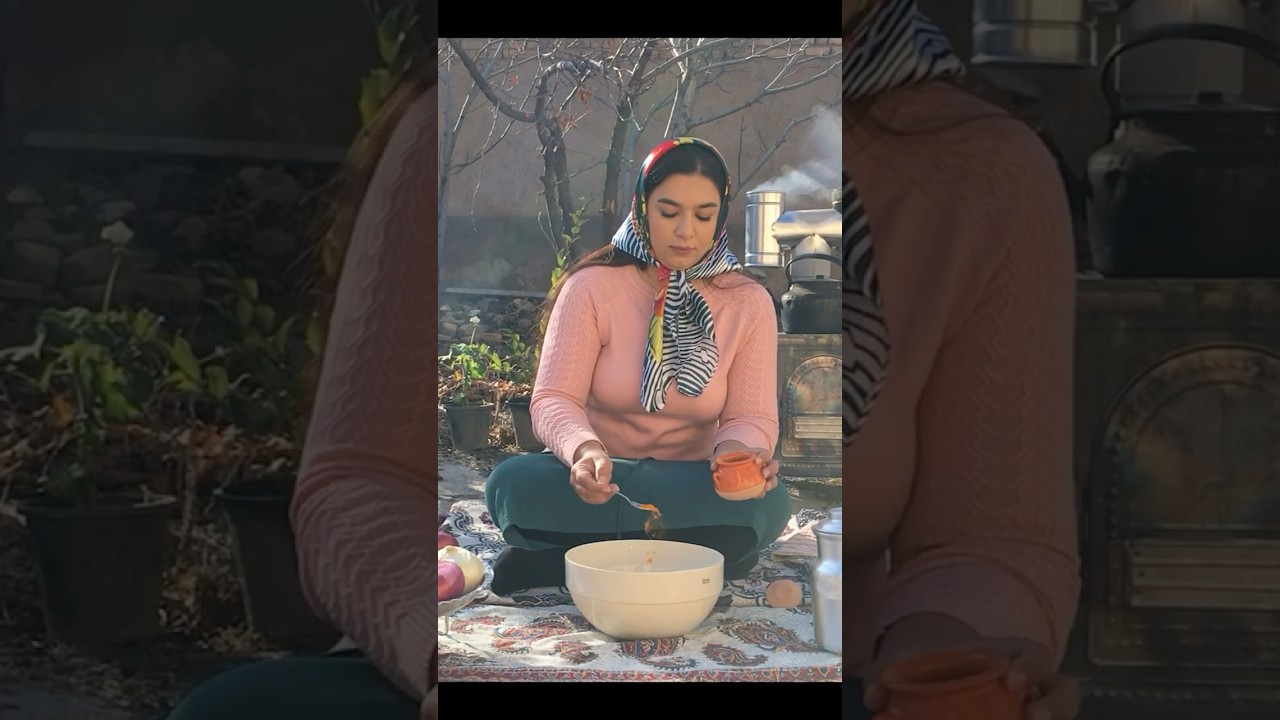 cooking bread on fire in village 