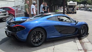 An azure blue mclaren p1 leaving lamborghini newport beach's supercar
show. (june 7, 2014 / costa mesa, ca)
