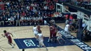 MBB: SMCs Omar Samhan works it to the basket