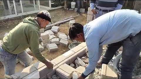 Interlocking Blocks - Laying the First Superstructure Course. Visit : Call @ 9312578095/9810298913