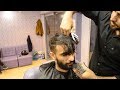 Amazing pakistani barber uses 27 pairs of scissors to cut hair