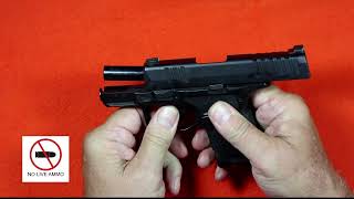 Strange way to oil a pistol.  Disassembly and lubrication of the Springfield Armory Hellcat