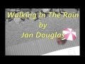 Walking In The Rain by Jan Douglas