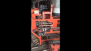 Automatic broom stick hanger cap fixing nailing machine