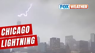Chicago Skyline Glows As Lightning Dances Across the Sky