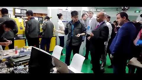 UNESCO Experts are visiting Chinese school workshop where Yornew small cnc machines are used part I