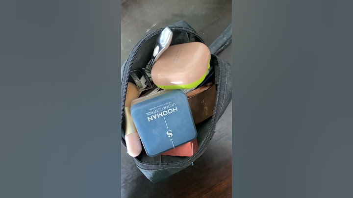 My travelling pouch🧡 #makeup #travelling #skincare