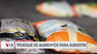 Venezolanos intercambian alimentos de las polémicas bolsas CLAP para subsistir