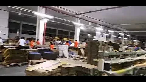 busy production line of cardboard display stand