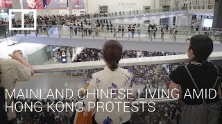 How do mainland Chinese citizens living in Hong Kong feel about the protests?