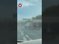 'Idiot' driver nearly causes motorway pile-up as huge trailer slams into barriers