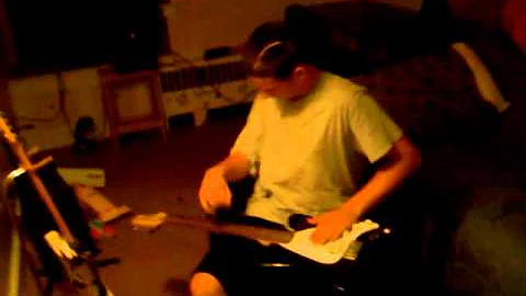 john trying to play his guitar after stroke