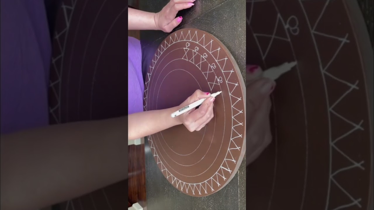 Warli Painting on wooden circle.