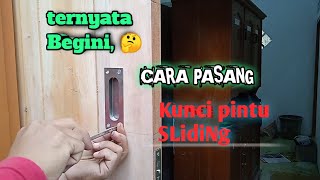 Cara memasang kunci pintu kayu sliding di kusen beton