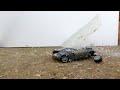 Model Aston Martin Gets Crushed By Ice Block