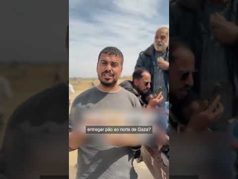 Palestino distribui pão a concidadãos famintos em Gaza