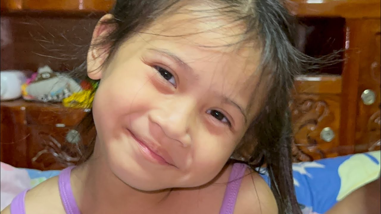 Sethika unboxes gummy for eating. 