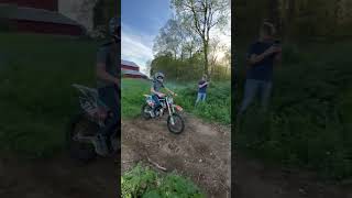 Dirt Bike Rider Falls Over After Jumping Off Of Rock - 1501959