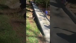 Woman Slips and Mimics Falling into Pool