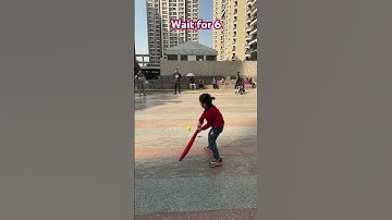 Little baby playing cricket