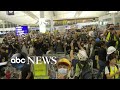 Prodemocracy protests turn violent as hong kong airport cancels flights again  abc news